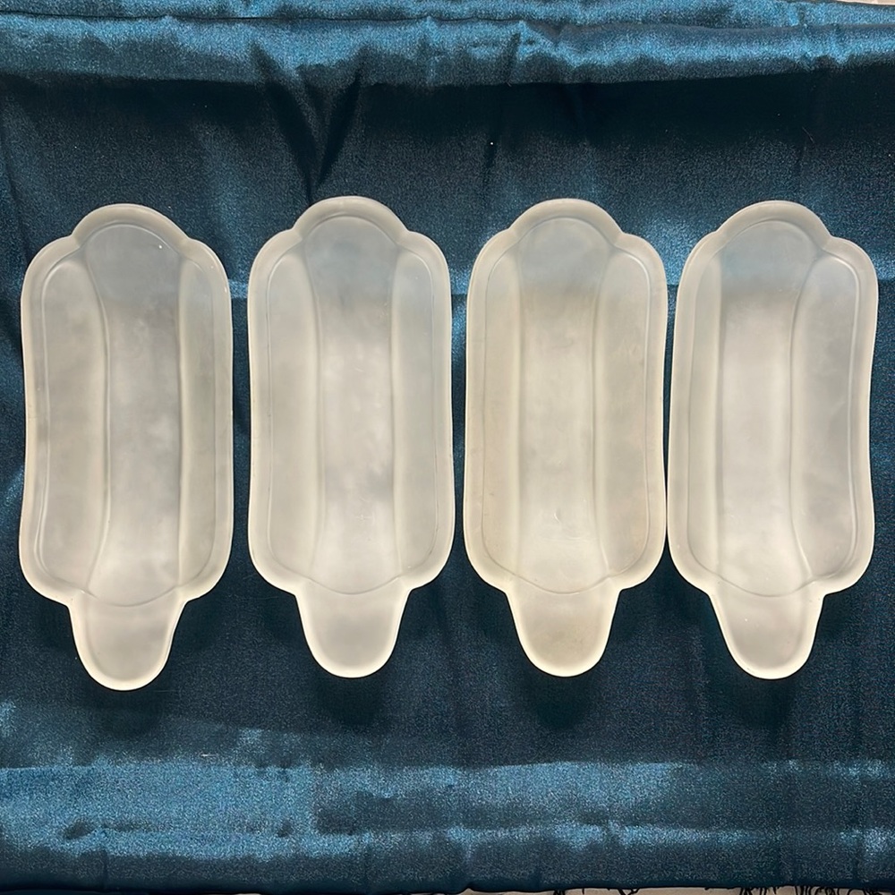 Rate find: Antique banana-split boat dishes in frosted glass.